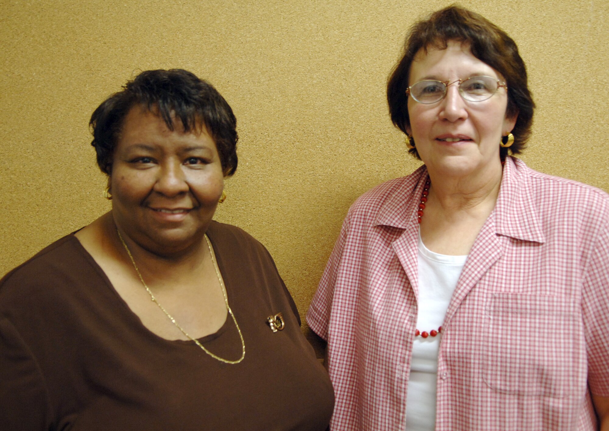 Terri Gillespie (left), Ramstein Elementary School music teacher for Kindergarten through 2nd grade, and Antonia Tinti, RES gifted education resource teacher, reflect upon their years as a teacher. Ms. Gillespie has been teaching for 29 years, 25 of those years at RES. Ms. Tinti has been teaching since 1966 and teaching at RES since 1984. (U.S. Air Force photo by Senior Airman Amanda Dick)