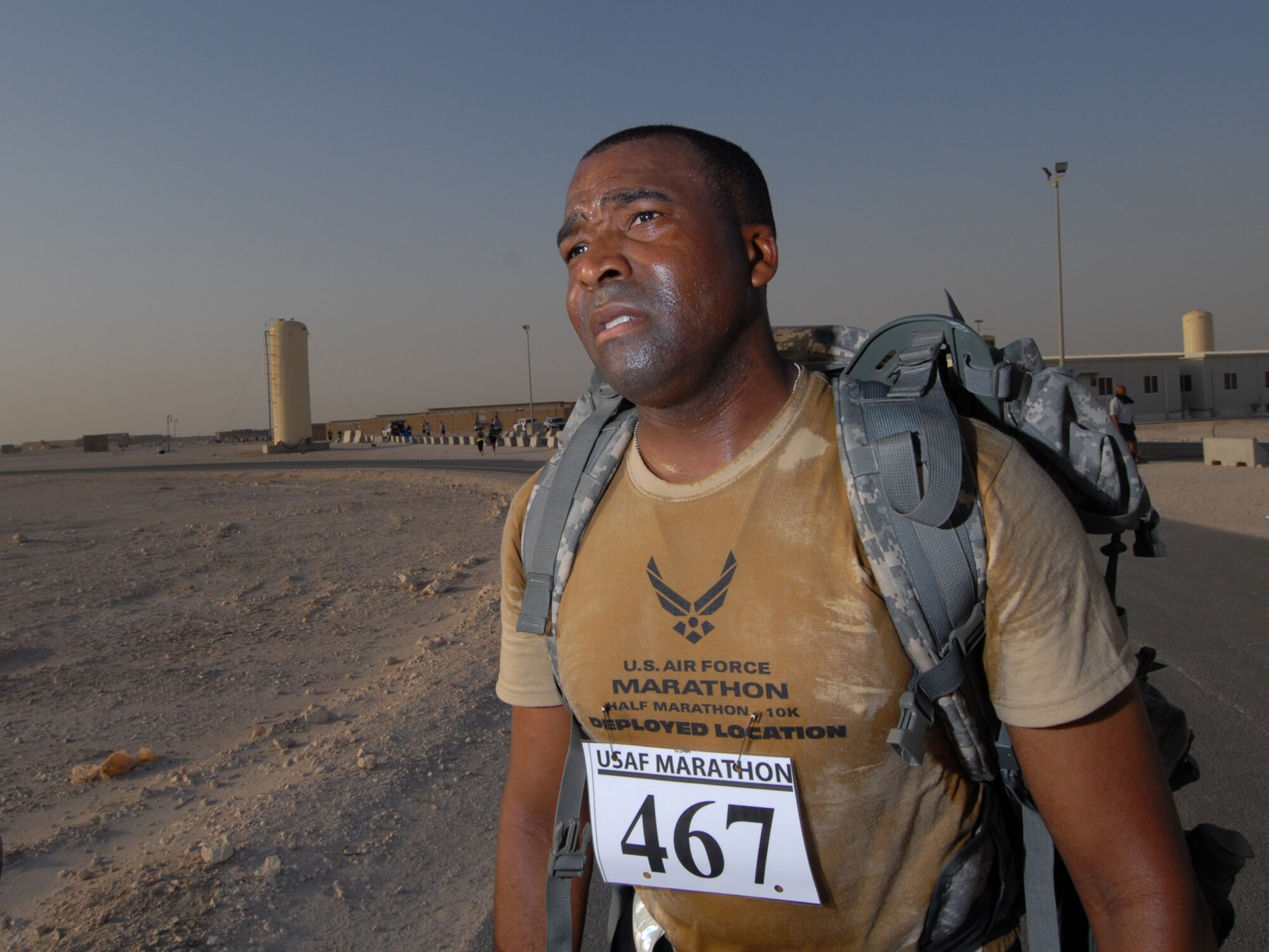SOUTHWEST ASIA -- Army Sgt. 1st Class Ronsoni Long of Charlie Battery, 1-43 Air Defense Artillery Brigade, ran a 10K in combat boots and carried a 35-pound rucksack, here, Sept. 11, 2009. He finished the run with a time of 78:33. More than 350 participants gathered at Memorial Plaza to take part in either a half-marathon or 10K run held in conjunction with the Air Force Marathon at Wright-Patterson Air Force Base, Ohio, Sept. 18, 2009. (U.S. Air Force Photo/Tech Sgt. Jason W. Edwards)