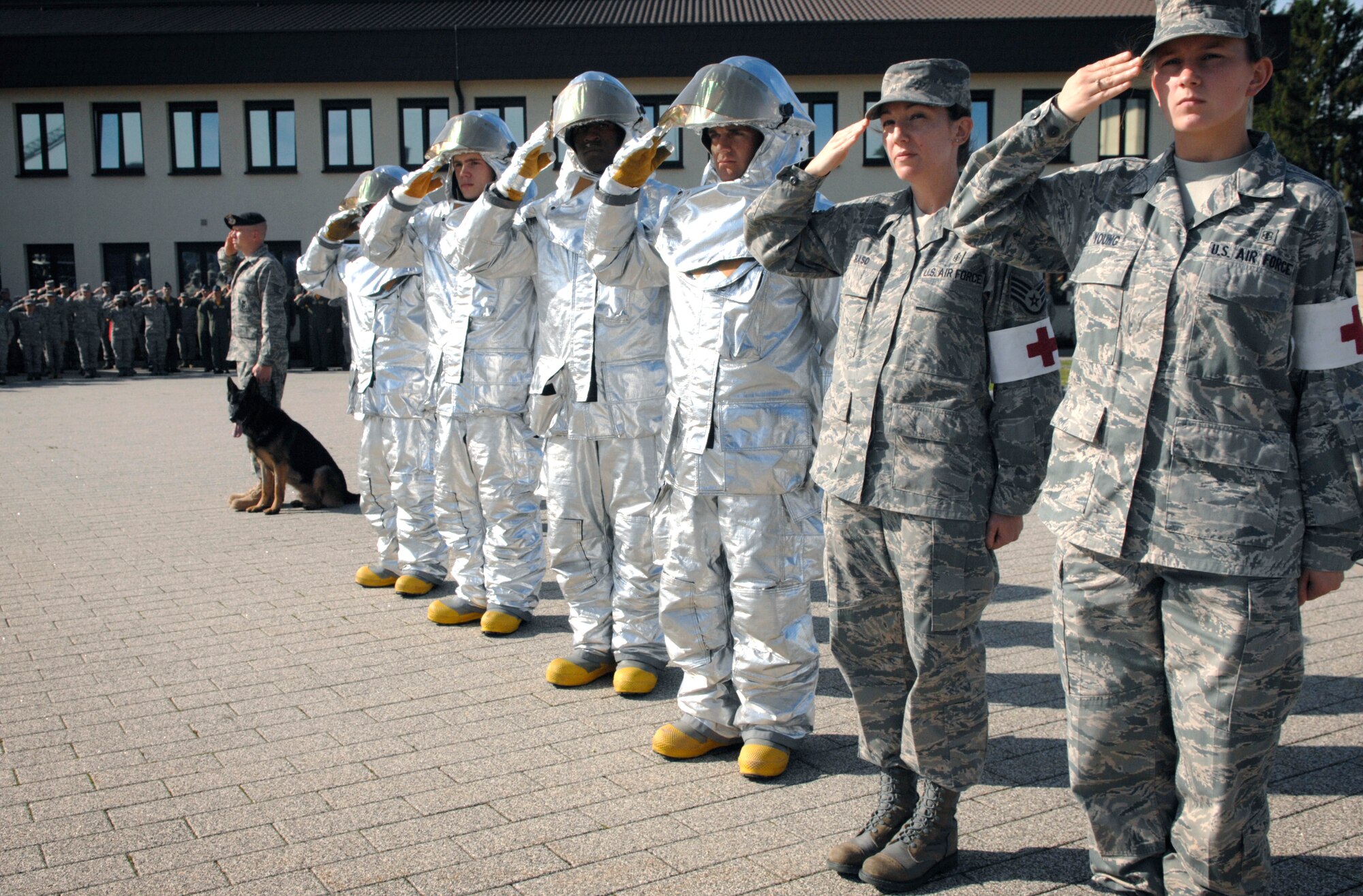 SPANGDAHLEM AIR BASE Germany – Members of the 52nd Fighter Wing’s salute for their respective fallen comrades who lost their lives during the Sept. 11 attacks in 2001.  A 9/11 retreat ceremony was held in front of the 52nd Fighter Wing headquarters building Sept. 11.  Approximately 200 people from the 52nd FW and tenant units attended the ceremony put together by the First IV.  (U.S. Air Force photo/Master Sgt. Bill Gomez)