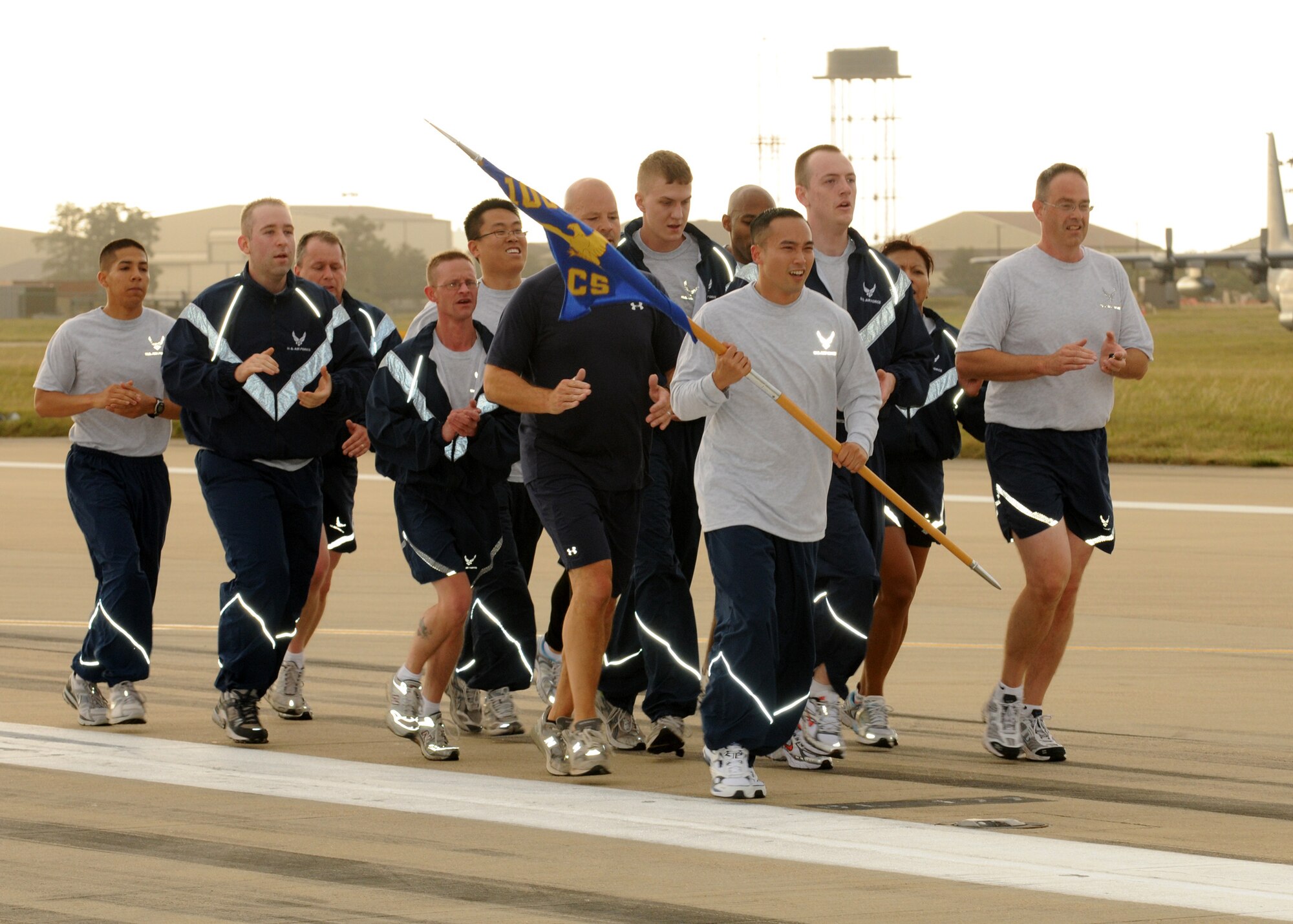 RAF MILDENHALL, England - Airmen from the 100th Communications Squadron, run in formation during the Prisoner of War, Missing in Action 5k remembrance run Sept. 14, 2009. (U.S. Air Force photo/ Staff Sergeant Jerry Fleshman)