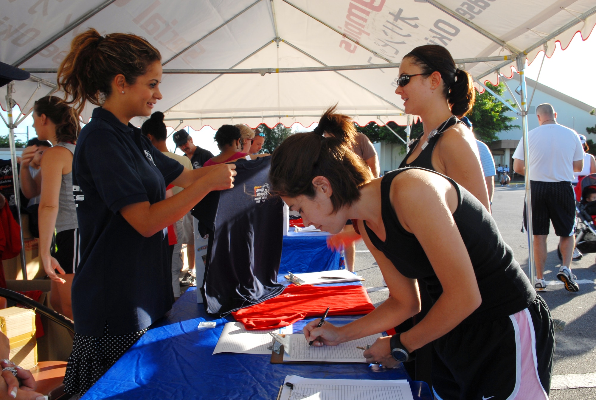 Participants kept pouring in to register for Kadena's Special Olympics 5K run fundraiser Sept. 12. The event had 400 runners and it raised $2,768 with participants ranging from middle grade school level to senior officers. 
(U.S. Air Force photo/Tech. Sgt. Reynaldo Ramon) 