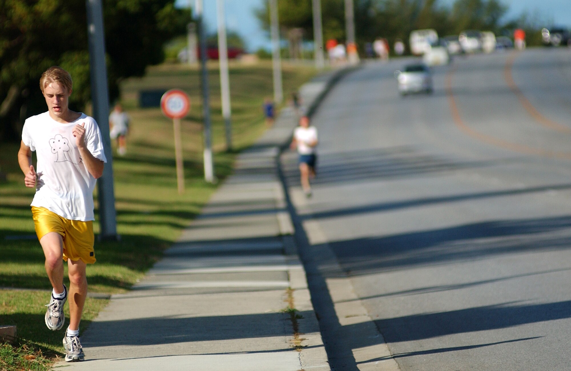 Jacob Bishop, member of the Kadena High School Panther cross country team, runs his heart out to come in first place during Kadena's Special Olympics 5K run held at the Risner Fitness Complex Sept. 12. 
(U.S. Air Force photo/Tech. Sgt. Reynaldo Ramon) 