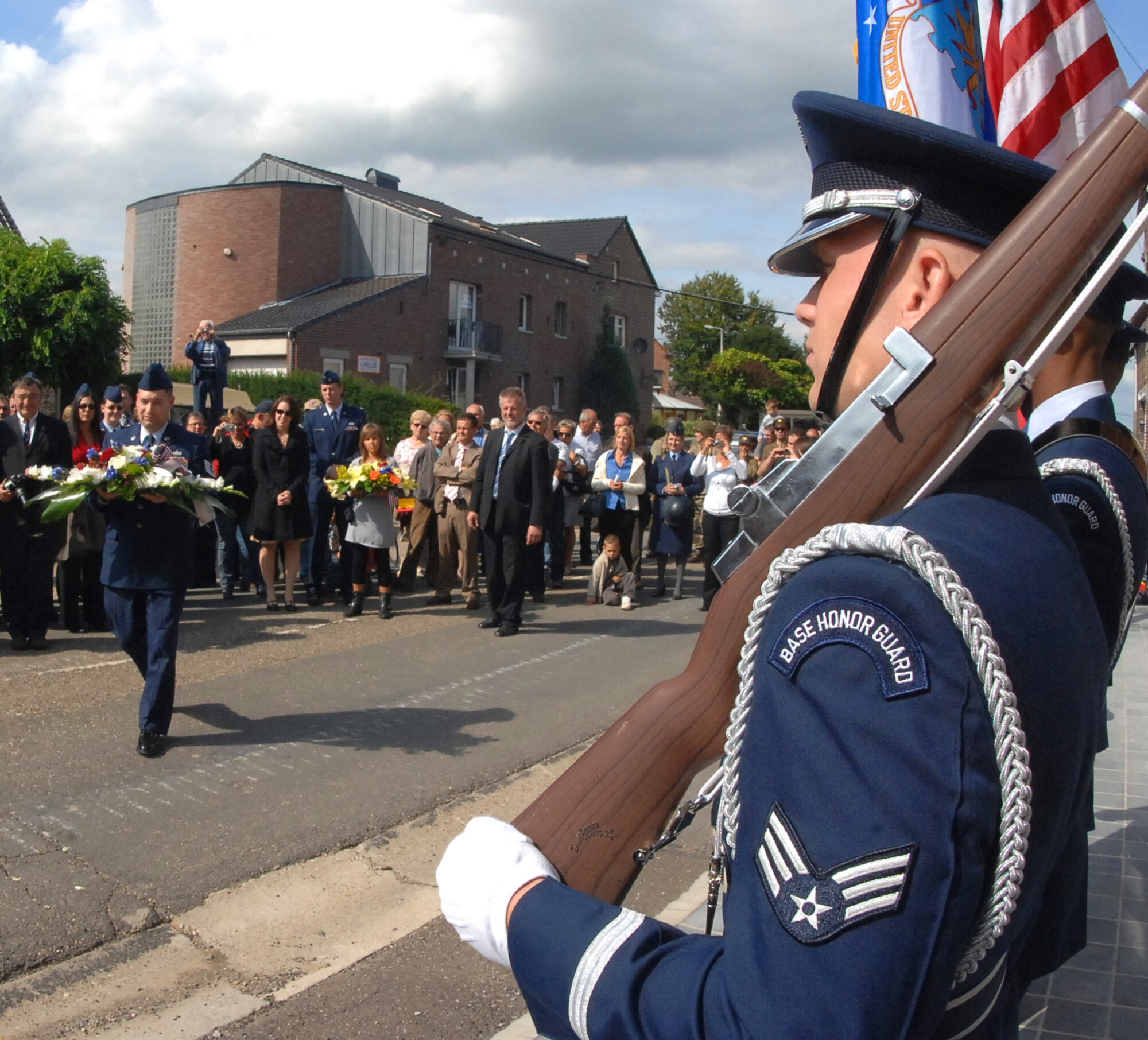 SPANGDAHLEM AIR BASE, Germany -- 52nd Fighter Wing Honor Guard member Senior Airman Thomas Burkhart, 52nd Equipment Maintenance Squadron, stands at attention during the laying of wreaths during a Liberation of Belgium Memorial Event in Fouron le Comte, Belgium, Sept 6.  The Honor Guard presented the colors and honored World War II veterans and the fallen Soldiers that liberated Belgium during WWII Sept. 12, 1944. (U.S. Air Force photo/Airman 1st Class Nick Wilson) 
