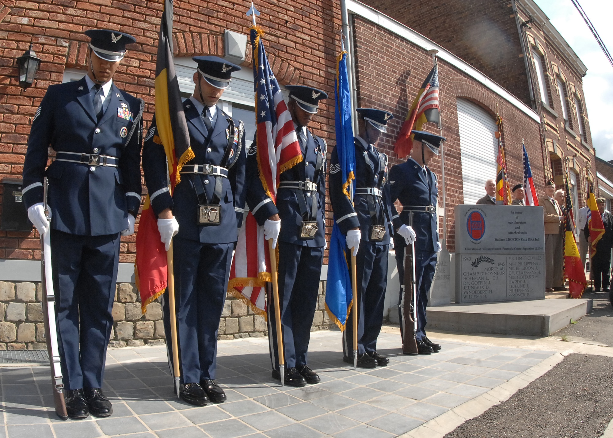 SPANGDAHLEM AIR BASE, Germany -- Members of the 52nd Fighter Wing Honor Guard find their dress during a 65th anniversary of the liberation of Belgium during a memorial event in Fouron le Comte, Belgium, Sept 6. The 52nd Fighter Wing Honor Guard went to Fouron le Comte to present the colors and honor World War II veterans and the fallen Soldiers that liberated Belgium during WWII Sept. 12, 1944. (U.S. Air Force photo/Airman 1st Class Nick Wilson) 