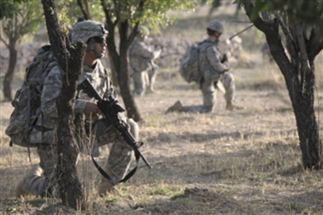 U.S. Army Pvt. Jame Ramos, attached to Alpha Company, 1st Battalion, 4th Infantry Regiment, provides security while on a dismounted patrol in the village of Sinon, Zabul province, Afghanistan, on Sept. 6, 2009.  The soldiers are deployed throughout southern Afghanistan in support of Operation Enduring Freedom.  