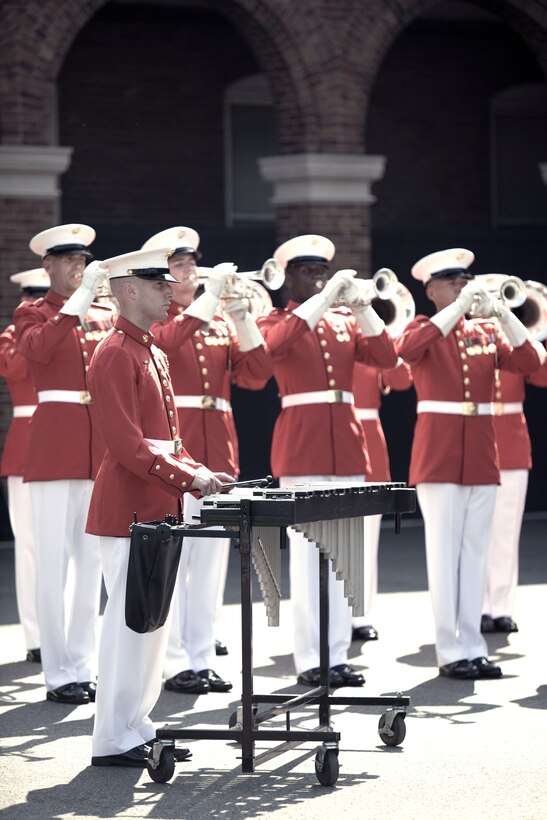 The U.S. Marine Drum and Bugle Corps performs during the dedication ceremony of Colonel Truman W. Crawford Hall at Marine Barracks Washington, Sept. 14. The hall will serve as the new headquarters and rehearsal area for "The Commandant's Own."