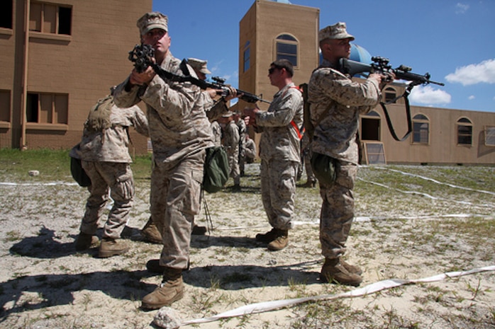 Marines from 1st Battalion / 9th Marine Regiment, Alpha Company, 1st platoon, attached to the 24th Marine Expeditionary Unit, practice room clearing and raid exercises during the mechanized raid course aboard Camp Lejeune. This training evolution will sharpen the skills these Marines use to take control of an objective while deployed with the 24th MEU. (U.S. Marine Corps photo by LCpl David Beall)