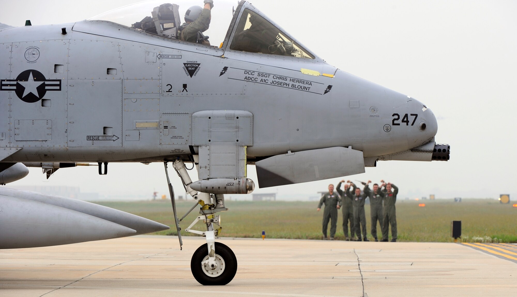 Airmen from the 51st Operations Group cheer on the pilot of an A-10 Thunderbolt II as he taxis at Osan Air Base, Republic of Korea, before heading to Red Flag Alaska 10-01 Sept. 14.  Airmen from Osan will join Airmen from across the world to participate in Red Flag Alaska 10-01, scheduled for Oct. 1-16. The exercise is considered by many as the most intense training opportunity available to combat flying units. (U.S. Air Force photo/Senior Airman Stephenie Wade) 
