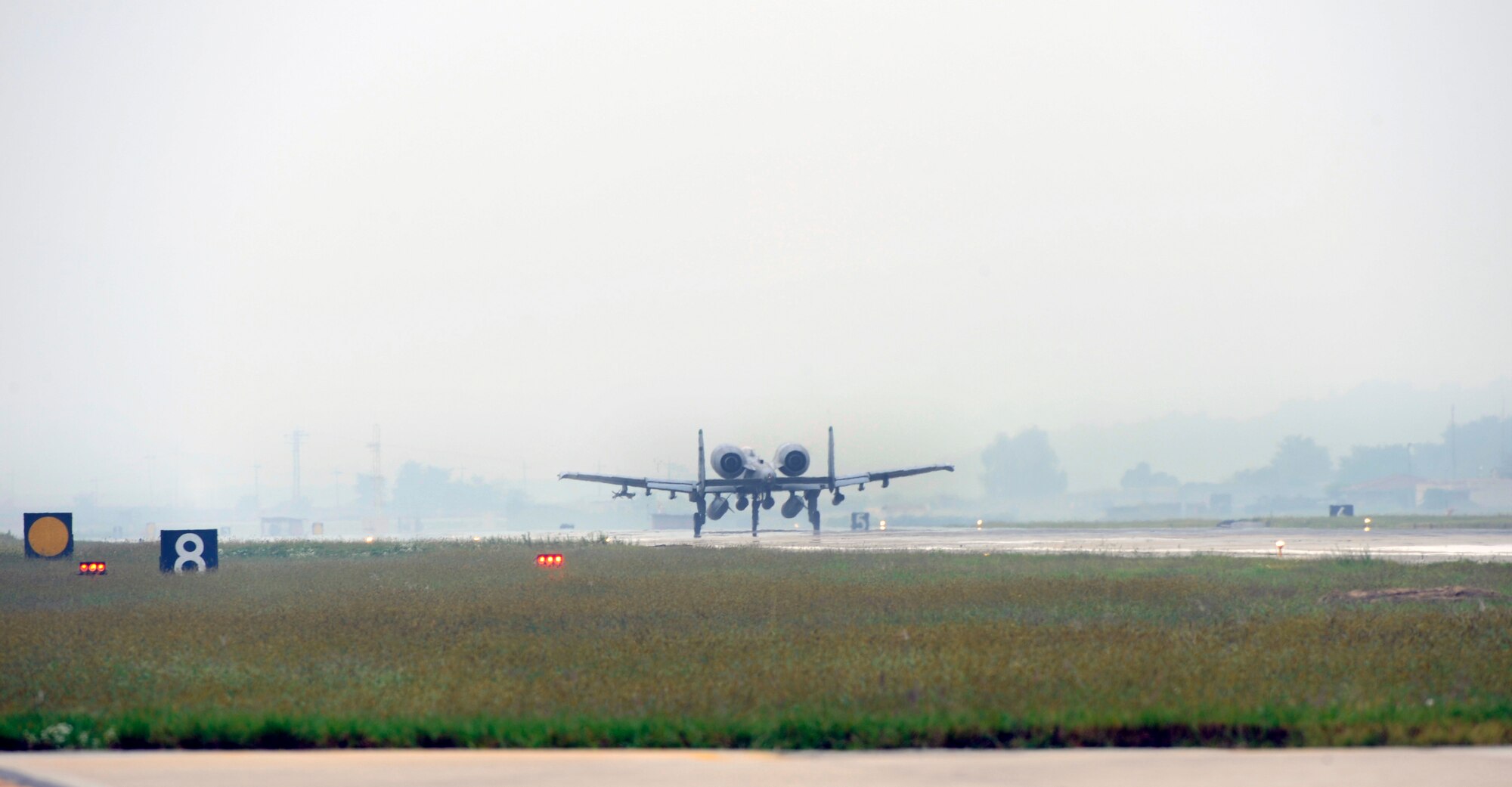 An A-10 Thunderbolt II departs the runway at Osan Air Base, Republic of Korea, for Red Flag Alaska 10-01 Sept. 14.  Airmen from Osan will join Airmen from across the world to participate in Red Flag Alaska 10-01, scheduled for Oct. 1-16. The exercise is considered by many as the most intense training opportunity available to combat flying units. (U.S. Air Force photo/Senior Airman Stephenie Wade) 

