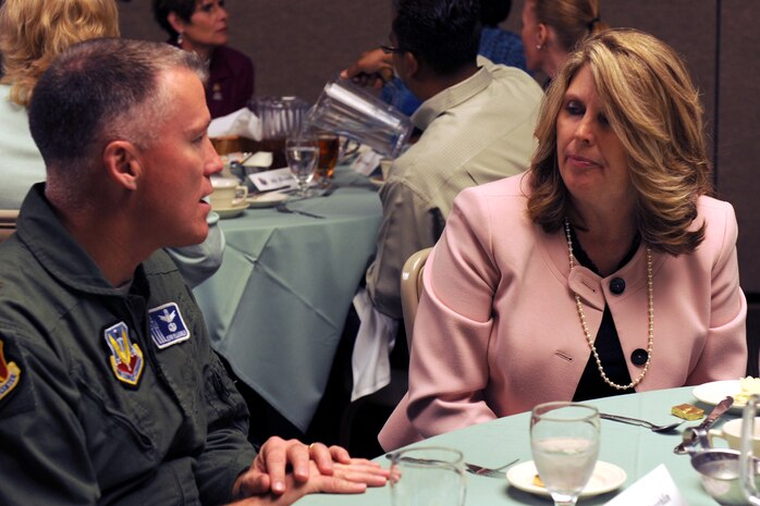 NELLIS AIR FORCE BASE, Nev.,-- Brig.Gen. Kevin McLaughlin, Vice Commander of the United States Air Force Warfare Center, speaks with Shari Buck, Mayor of the city of North Las Vegas, during the Civilian Military Community Luncheon, Sept. 15. Held quarterly, leaders from the Las Vegas community and Nellis gather to discuss current events in the community, build relations and recognize outstanding Airmen.  (U.S. Air Force photo by Airman 1st Class Brett Clashman)
