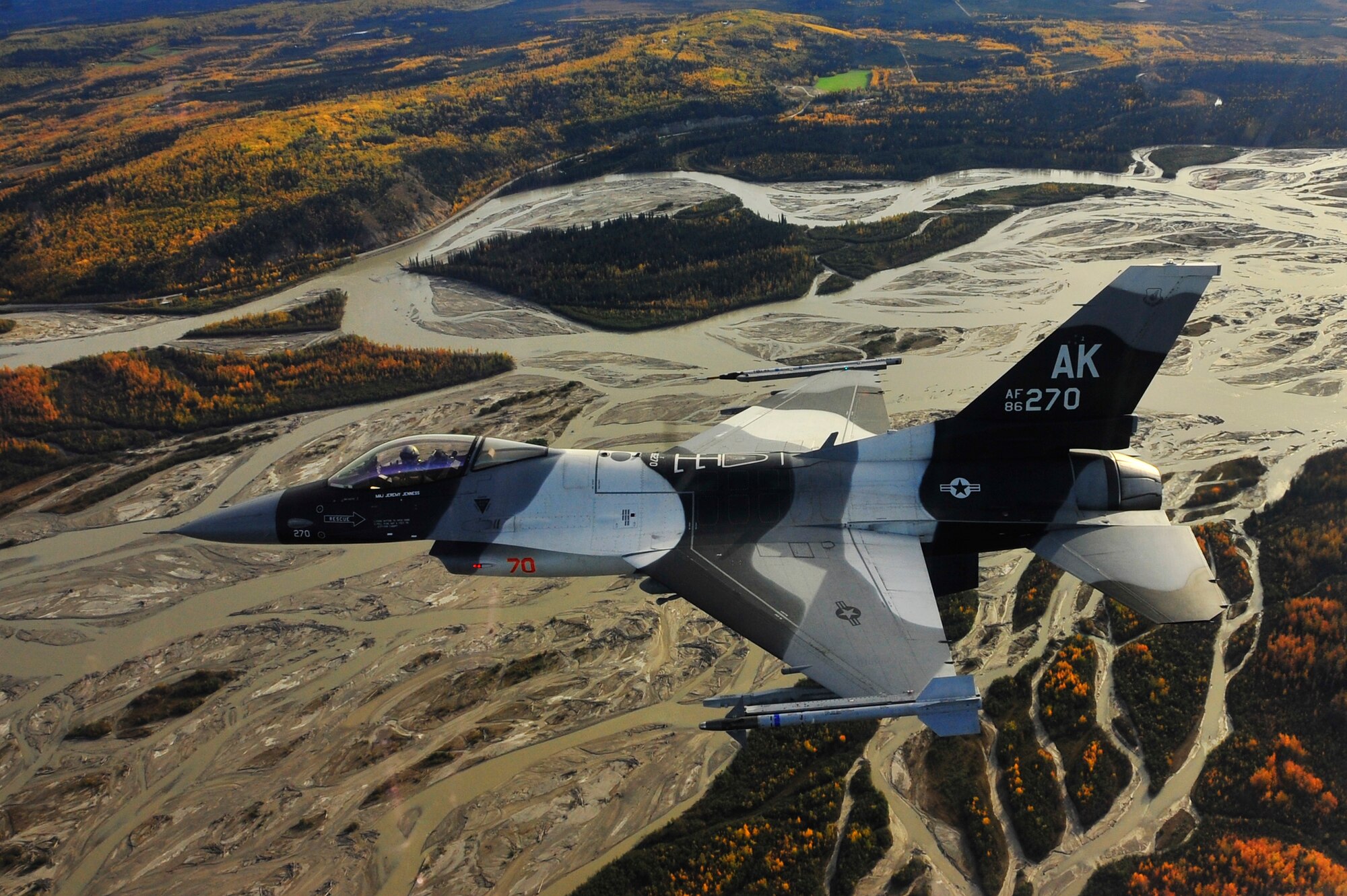 An F-16 Aggressor flies over the Joint Pacific Alaska Range Complex Sept. 14, 2009, Eielson Air Force, Base, Alaska. The F-16s are assigned to the 18th Aggressor Squadron, which is responsible for training and preparing joint and allied aircrews for combat missions. (U.S. Air Force photo/Staff Sgt. Christopher Boitz)