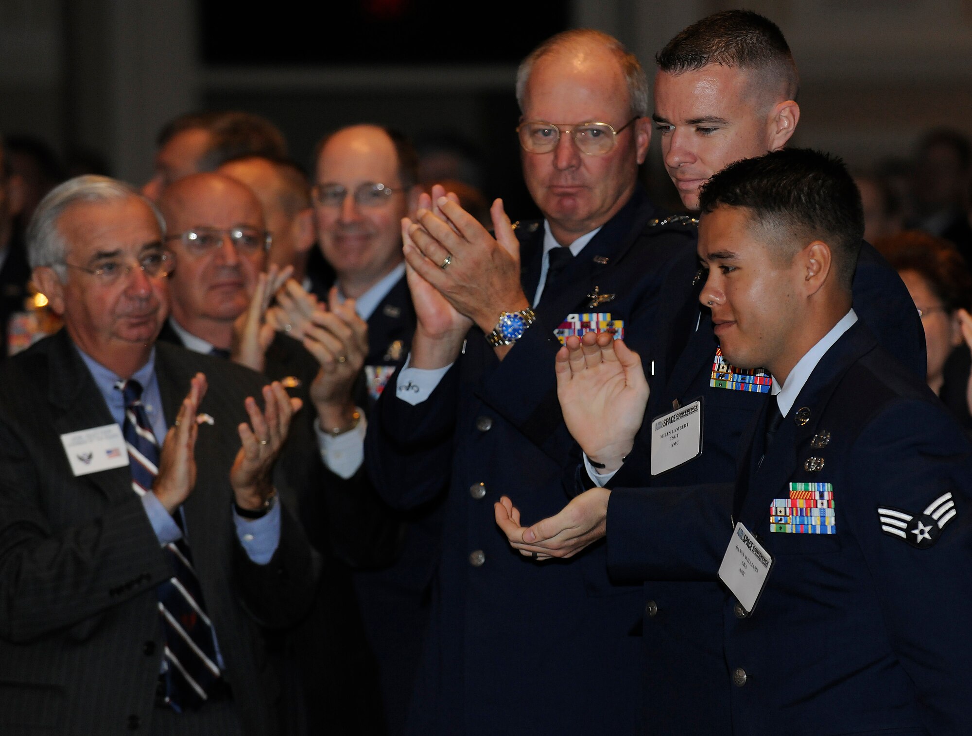 Senior Airman Danny Williams receives a standing ovation from attendees at the Air Force Association Air and Space Conference and Technology Exposition Sept. 15, 2009, at Oxon Hill, Md.  Air Force Chief of Staff Gen. Norton Schwartz heralded Airman Williams during his keynote address as an example of the today's hero Airmen.  (U.S. Air Force photo/Scott M. Ash)