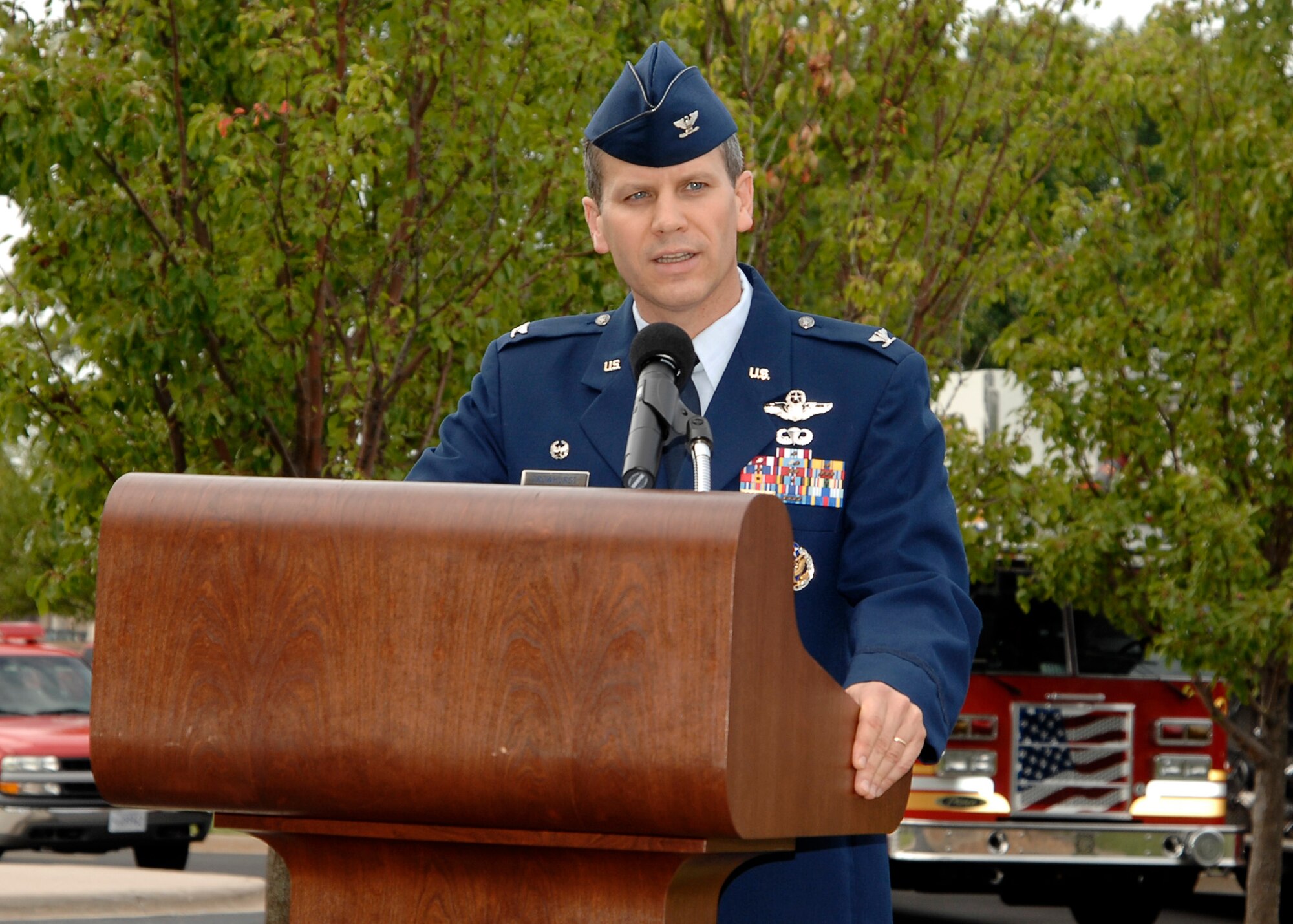 Col. James Crowhurst, 22nd Air Refueling Wing commander, addresses an audience of military and civilian participants during a Patriot Day ceremony, Sept. 11, 2009, at McConnell Air Force Base, Kan. Military first responders from the 22nd Civil Engineer Squadron, 22nd Security Forces Squadron and 22nd Medical Group joined their civilian counterparts to pay respect to those who lost their lives Sept. 11, 2001. (U.S. Air Force photo/Senior Airman Anthony Mejia)