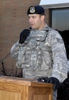 MINOT, N.D. -- Staff Sgt. Kevin Snelson, 219th Air National Guard security response force leader, speaks with community members of Team Minot at the Magic City Campus High School during a ceremony remembering the lives lost and commemorating the heroism and comradery in the Sept. 11, 2001 terrorist attacks Sept. 11 here. (U.S. Air Force Photo by Airman 1st Class Benjamin Stratton)