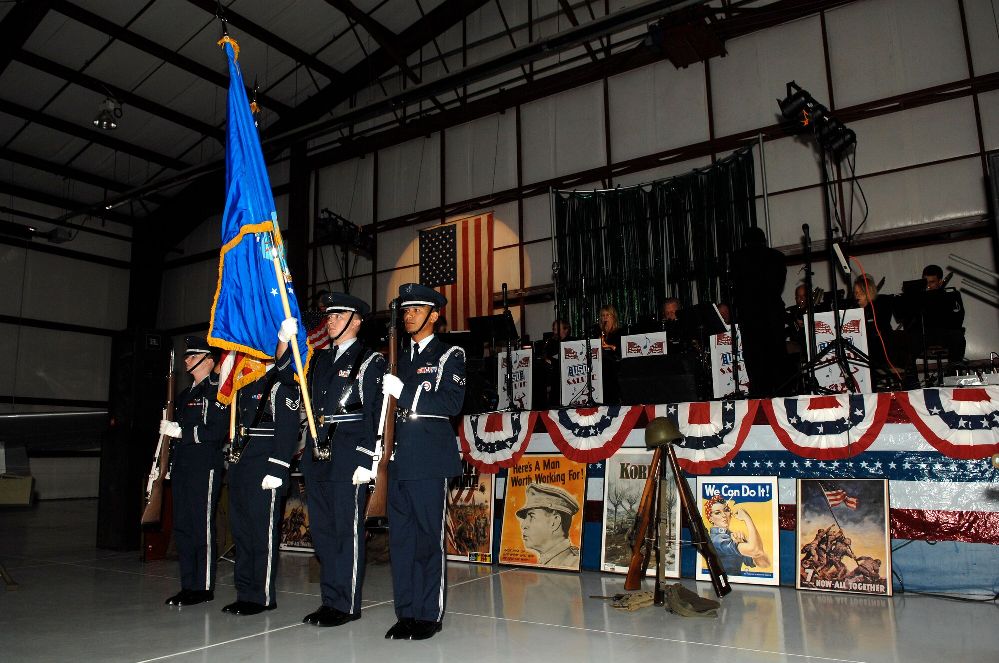 MINOT AIR FORCE BASE, N.D. -- The base honor guard team from here presents the colors during the National Anthem at the Dakota Territory Air Museum in Minot Sept. 11. Approximately 250 people attend the event, which was designed as a salute to all those who have served and are currently serving our great country.  (U.S. Air Force photo by Senior Airman Matthew Smith)