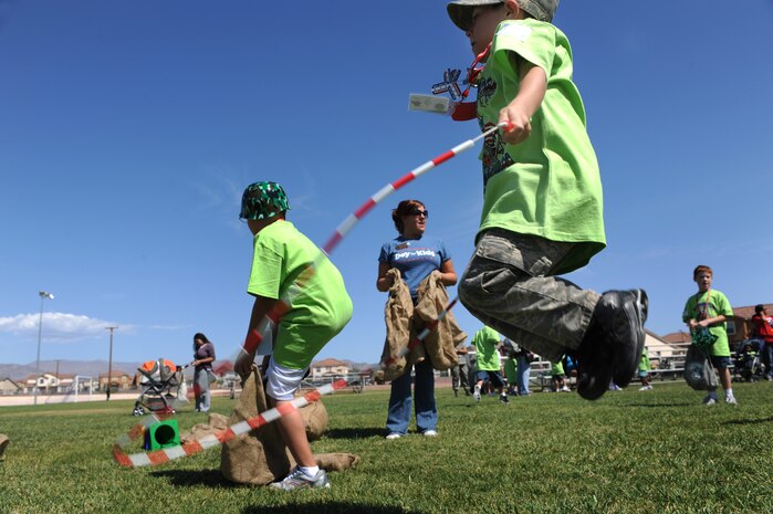 NELLIS AIR FORCE BASE Nev.,-- Noah Beach jumps rope during the physical training portion of a mock deployment outside the Nellis youth center. The mock deployment is in support of the Kids Understanding of Deployment Operations program better known as Operation KUDO's.  Hundreds of military children participated in the Operation KUDO's deployment at the Nellis Air Force Base on Sept. 12.
(U.S. Air Force photo by Tech. Sgt. Michael R. Holzworth)
