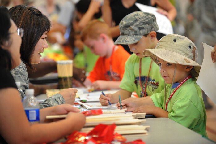 NELLIS AIR FORCE BASE NEV.,-- Sammy and Scotty Piper get legal advise and fill out power of attorney while they go through a mock pre-deployment line in support of the Kids Understanding of Deployment Operations program better known as Operation KUDO?s. Hundreds of military children participated in the Operation KUDO's deployment at the Nellis Air Force Base youth center on Sept. 12.
(U.S. Air Force photo by Tech. Sgt. Michael R. Holzworth)
