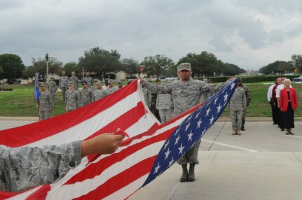 Randolph AFB, TX, 11 Sep 09:  SSgt Christopher Garcia, 12th Force Support Squadron, fold the flag during a retreat ceremony, commemorating Patriots Day.  (U.S. Air Force photo by Rich McFadden)