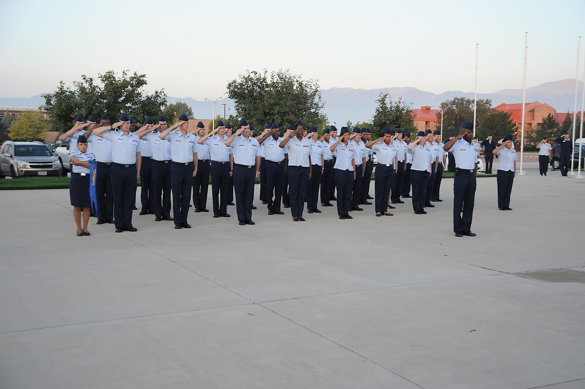 Members of Team Pete stand in formation during the POW-MIA reveille ceremony Sept. 14 at the Vosler NCO Academy parade field. The 21st Space Wing will host its annual POW-MIA remembrance ceremony at 9 a.m. Sept. 18 at the chapel. The guest speaker is retired Col. Gordon Scott. Colonel Scott served as a pilot with the 78th Fighter Squadron in Hawaii and flew air to ground support missions at Iwo Jima. (Air Force photo by Roberta McDonald)
