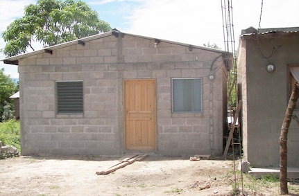 SOTO CANO AIR BASE, Honduras — A photo of one of the completed homes that Joint Task Force-Bravo members helped with. Habitat for Humanity Honduras homes like this typically have two bedrooms, a living and dining room, a bathroom, running water, a small front porch and screened windows for added protection from insects. JTF-Bravo members have been working with Habitat since March 28, and since then they have helped Habitat with a total of 11 houses in La Paz and Comayagua (Courtesy Photo).