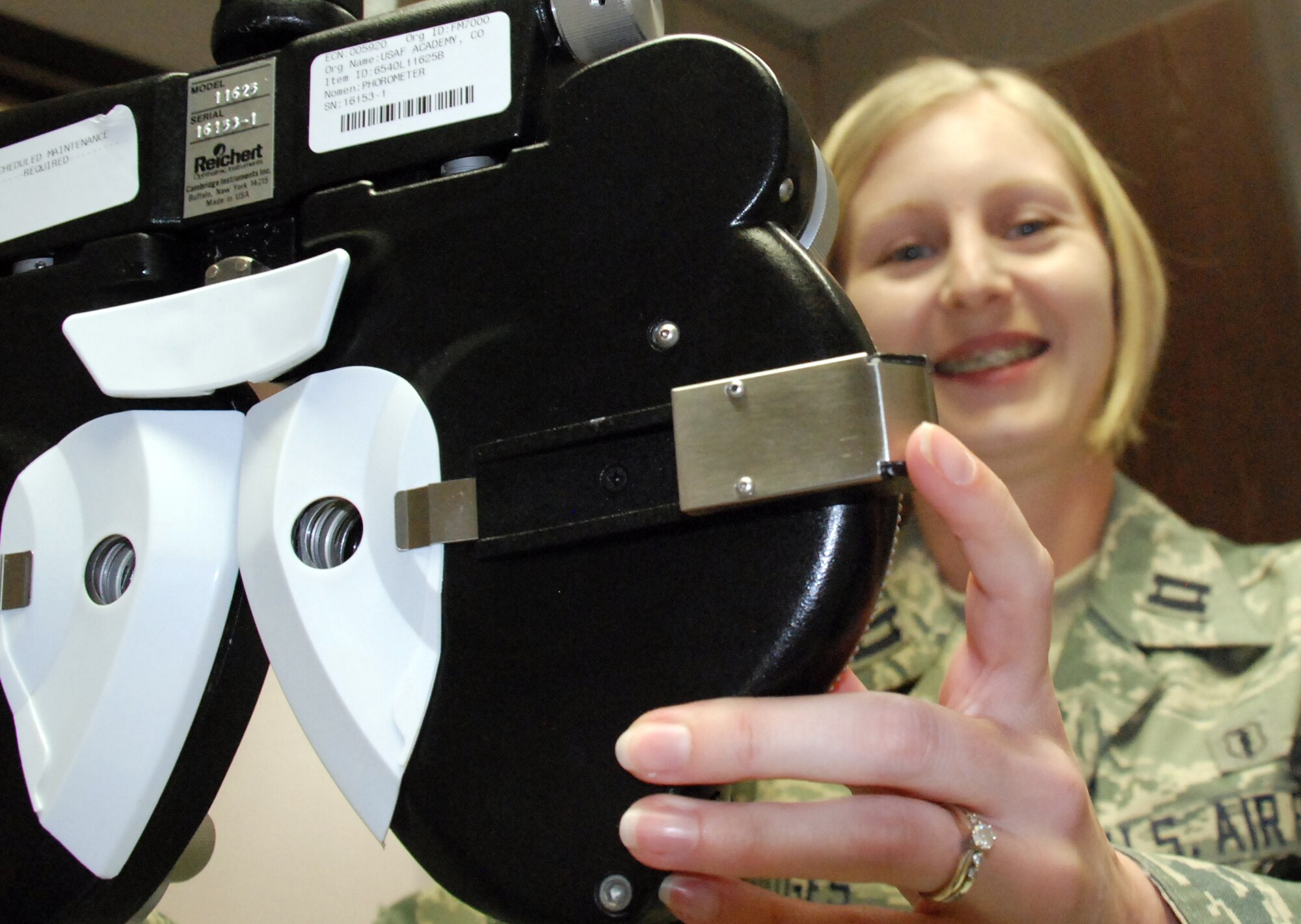 Capt. Loralie Hodges recommends regular eye exams as part of routine health care. Early detection is key for optometrists to treat a variety of sight disorders. Captain Hodges is an optometrist with the 10th Medical Group at the U.S. Air Force Academy in Colorado Springs, Colo. (U.S. Air Force photo/Ann Patton)