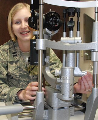 Capt. Loralie Hodges recommends regular eye exams as part of routine health care. Early detection is key for optometrists to treat a variety of sight disorders. Captain Hodges is an optometrist with the 10th Medical Group at the U.S. Air Force Academy in Colorado Springs, Colo. (U.S. Air Force photo/Ann Patton)
