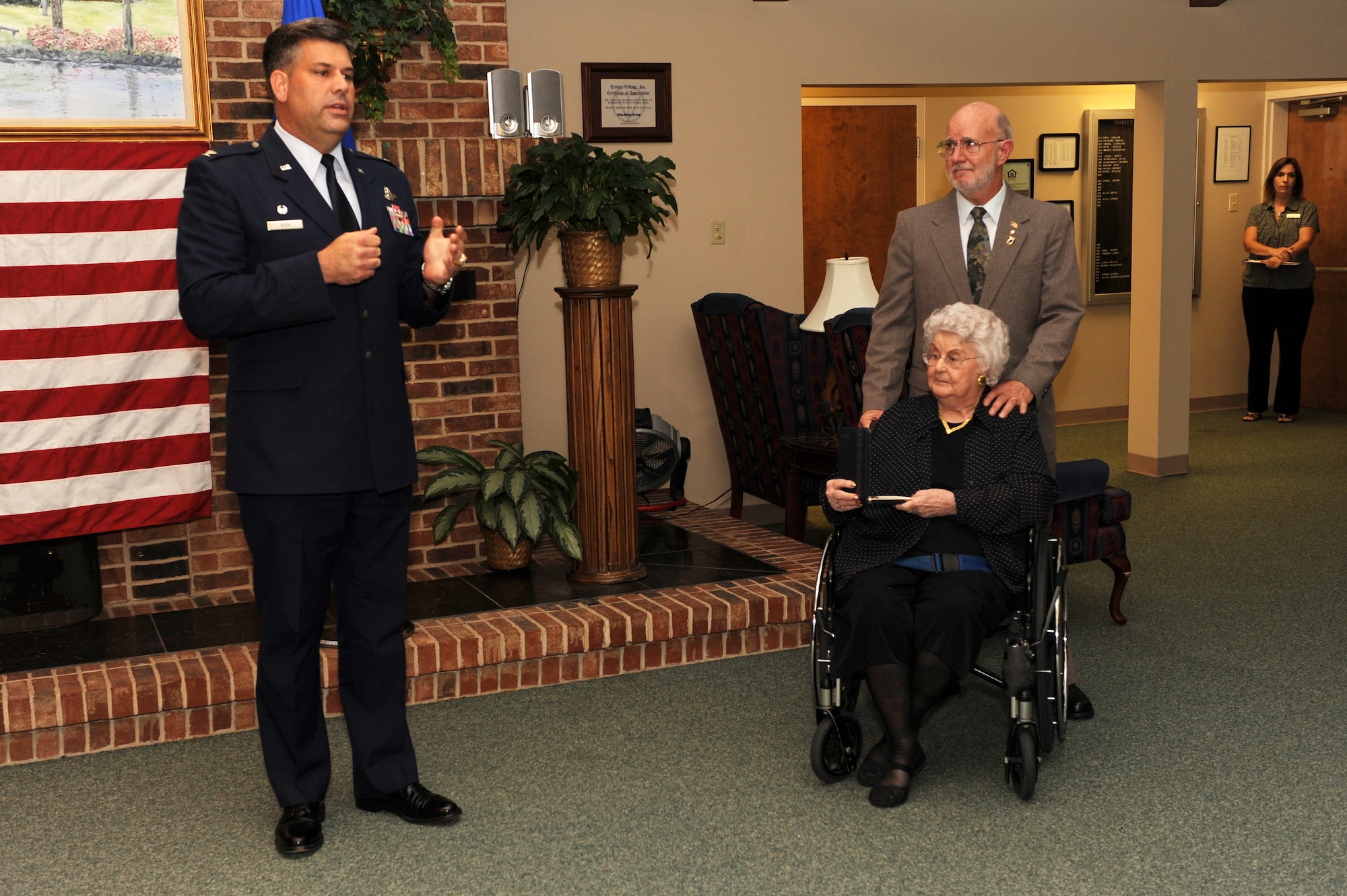 Col. Greg Otey, 19th Airlift Wing commander, speaks on behalf of the late retired Col. Virgil Meroney during his posthumous Prisoner of War medal presentation at the Trinity Village Retirement Community, Pine Bluff, Ark. Sept. 9. Colonel Meroney was captured and held as a POW in Germany during WW II for a year before escaping captivity near the Rhine River. (US Air Force photo by Senior Airman Jim Araos)