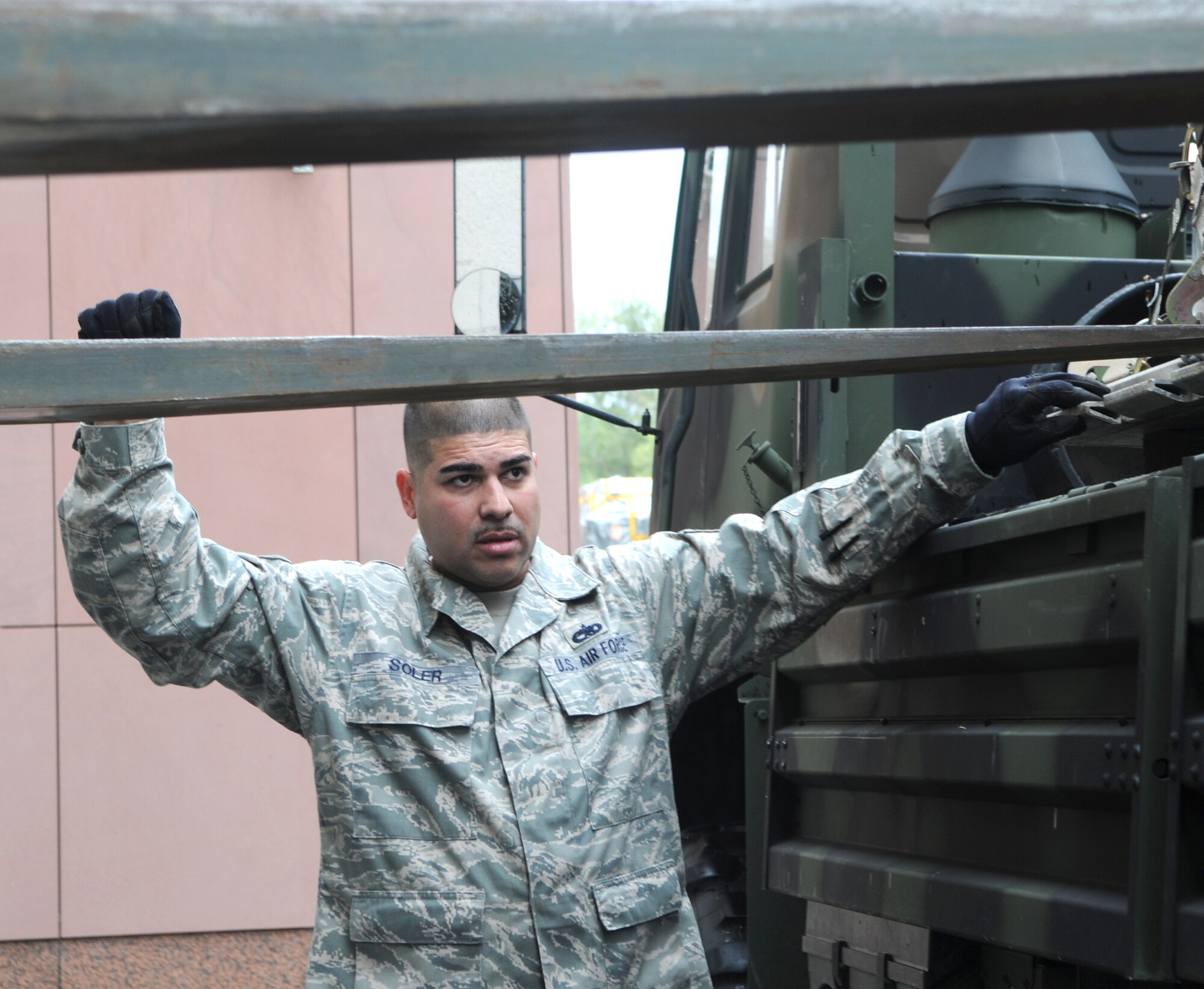 U.S. Air Force Tech. Sgt. Ramon Soler, member of the 1st Combat Communications Squadron, safely guides a forklift prior to securing a pallet in preparation for a convoy exercise from Ramstein Air Base Germany to Aviano Air Base Italy.  The convoy consists of seven trucks carrying approximately 10 tons of cargo.  (U.S.Air Force photo by: TSgt Sean Mateo White)