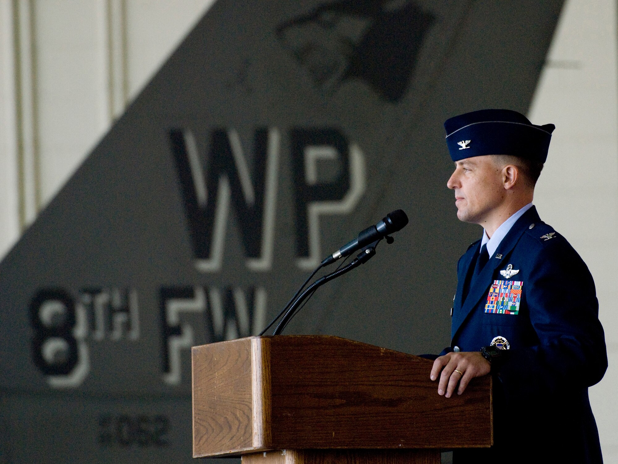 KUNSAN AIR BASE, Republic of Korea -- Col. Robert Givens 8th Fighter Wing commander, addresses his wing for the first time during the 8th Fighter Wing change of command Sept. 15. Colonel Givens will be the 49th "Wolf" to command the 8th Fighter Wing.(U.S. Air Force photo/ Senior Airman Jonathan Steffen)