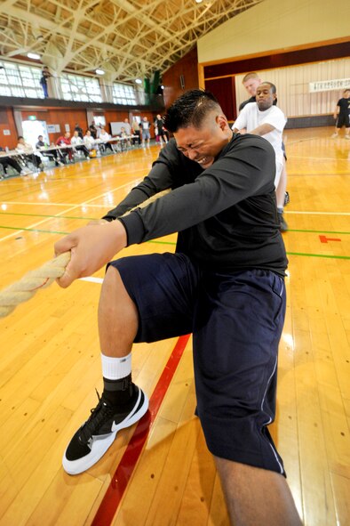 MISAWA AIR BASE, Japan -- The 35th Communications Squadron’s Comm Rockers compete during the Misawa Air Base Tug-of-war Tournament Sept. 12. The event allowed American and Japanese personnel to bond and strengthen ties. (U.S. Air Force photo/Senior Airman Jamal D. Sutter)