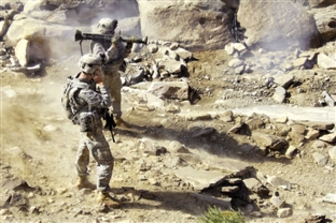 U.S. Army Sgt. Morales engages a target cave with an armor-piercing projectile in the mountains during Operation Champion Spear outside the village of Marsac in Paktia province, Afghanistan, Sept. 6, 2009. Morales is assigned to the 25th Infantry Division's 1st Battalion, 501st Infantry Regiment, 4th Brigade Combat Team.