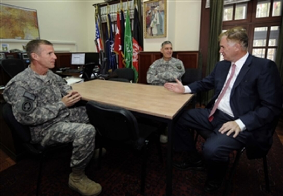 Commander of International Security Assistance Force Gen. Stanley McChrystal, U.S. Army, and Deputy Commander Lt. Gen. David Rodriguez talk with Deputy Secretary of Defense William J. Lynn III at International Security Assistance Force headquarters in Kabul, Afghanistan, on Sept. 9, 2009.  