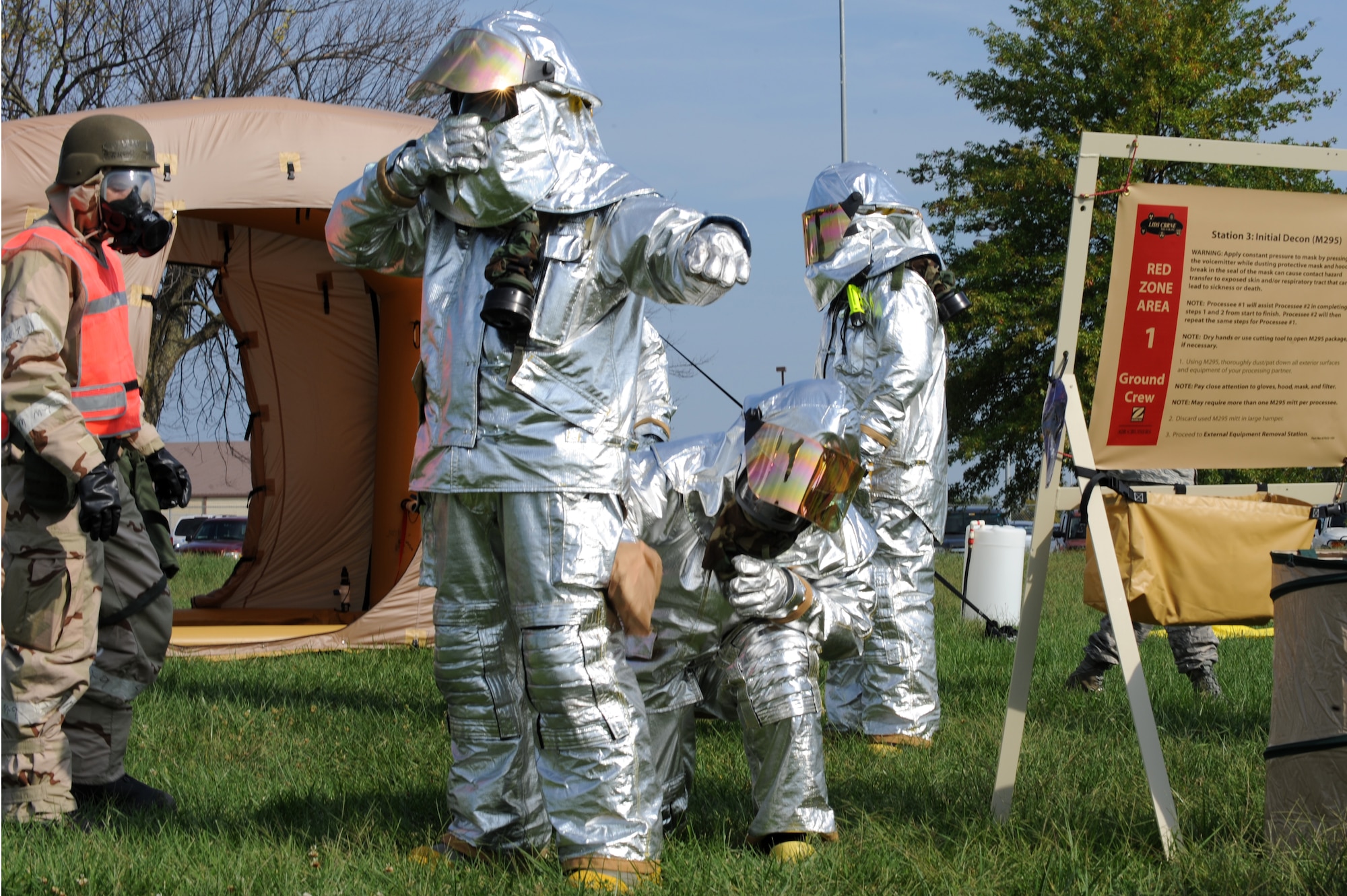 WHITEMAN AIR FORCE BASE, Mo. – Technical Sergeant Charles Roush, 442nd Fighter Wing, Decontaminates Staff Sergeant Brent Hanson, 442nd Fighter Wing, Sept. 16. The 442nd Fighter Wing has exercise to ensure their members remain current on their readiness training. (U.S. Air Force Photo/ SrA Cory Todd)