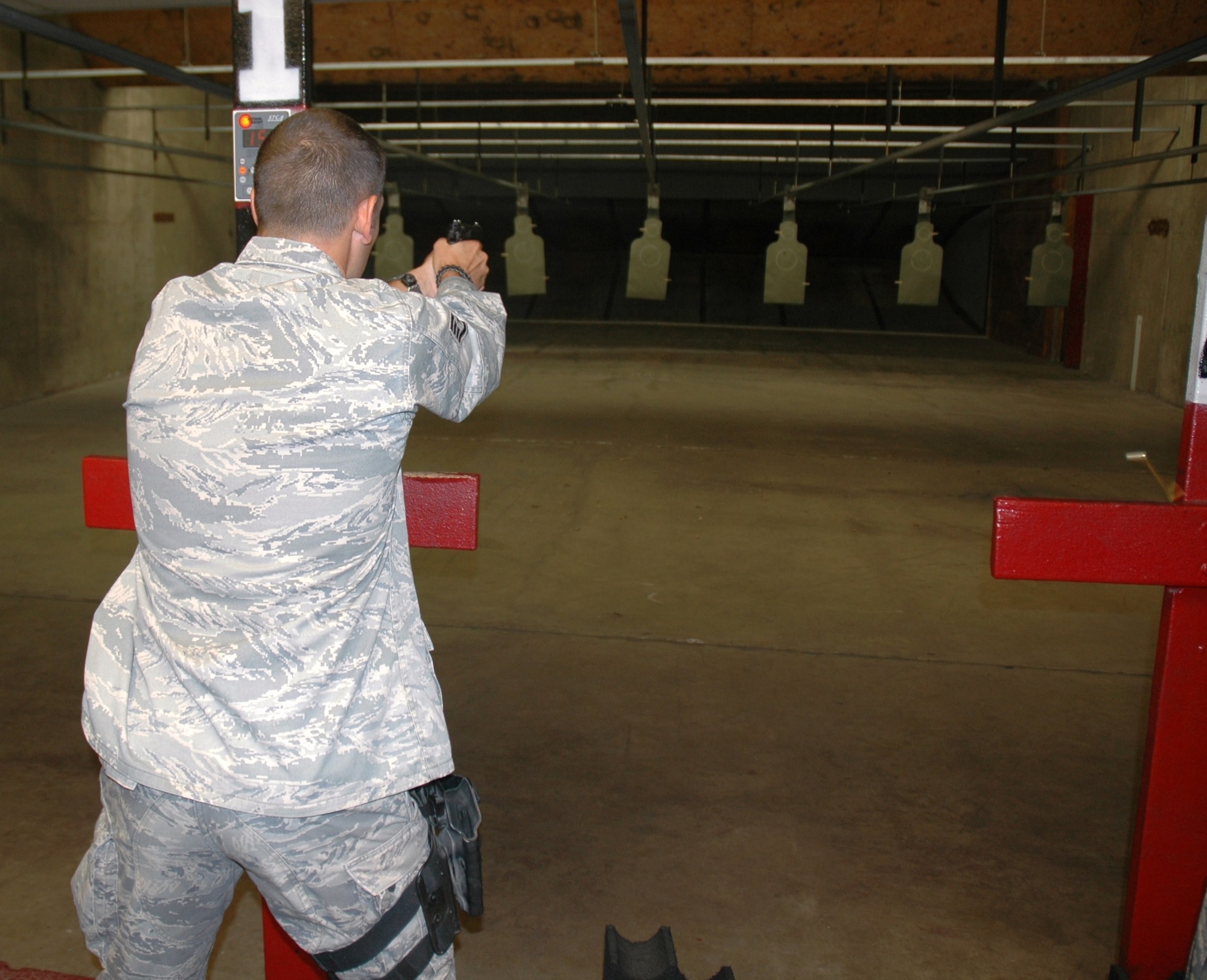 Staff Sgt. Daryl Gladstein, 944th Security Forces Squadron, fires for weapons qualification Sept. 12 at Combat Arms Training here. (U.S. Air Force photo/Staff Sgt. Louis Vega)