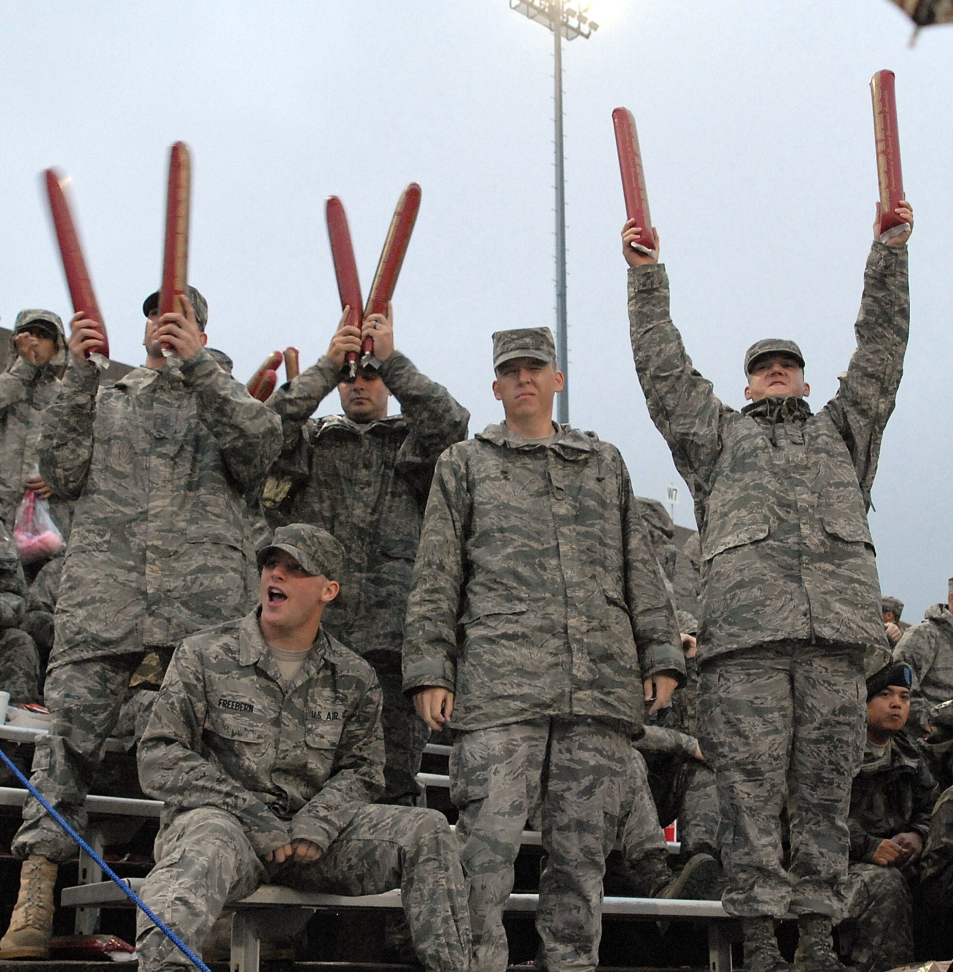 Airmen cheer on the Midwestern State University Mustangs Sept. 12 during the school’s Salute to Military football game at the Memorial Stadium. Every year MSU sets aside a game to honor Airmen, Soldiers, Sailors and Marines for serving. 
