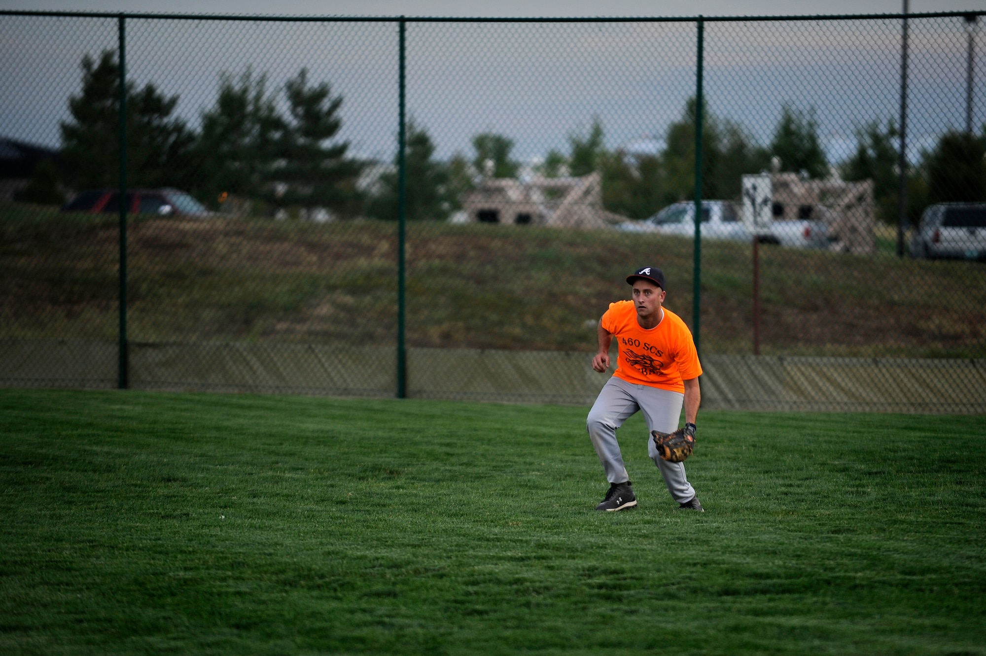 BUCKLEY AIR FORCE BASE, Colo. – Dustin Sneed, 460th Space Communications Squadron, moves in for a catch during the softball finals Sept. 14. The 460th Space Communications Squadron beat Naval Information Operations Command – Colorado 16-6 and 13-3 in a double elimination base championship final.  (U.S. Air Force photo by Senior Airman Steven Czyz)