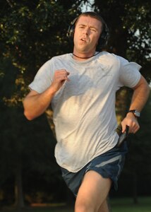Ryan Peake finishes in first place during the Commander's 5K Run/Walk Challange here Sept. 11. The Fitness and Sports Center hosts monthly fun runs to promote fitness for the wing. Peake is a military personnel section officer with the 437th Force Support Squadron. (U.S. Air Force photo/Senior Airman Katie Gieratz)(RELEASED)