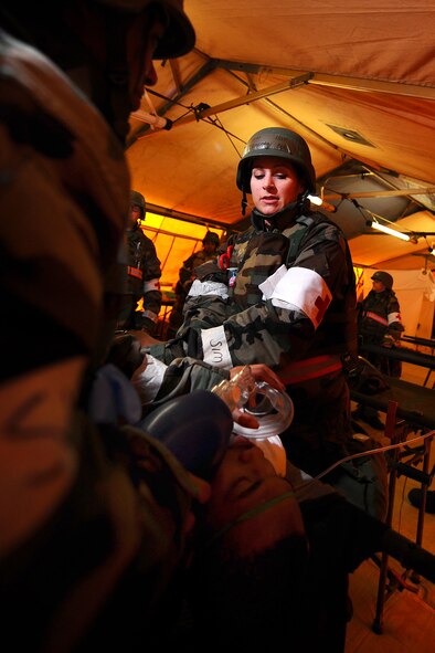 OFFUTT AIR FORCE BASE Neb. -- Staff Sgt. Rebekah Boe, 55th Medical Group, performs CPR on a mock patient requiring resuscitation inside the medical tent located at "Base X," Sept. 12, as part of an Operational Readiness Inspection.  

U.S. Air Force Photo by Josh Plueger

