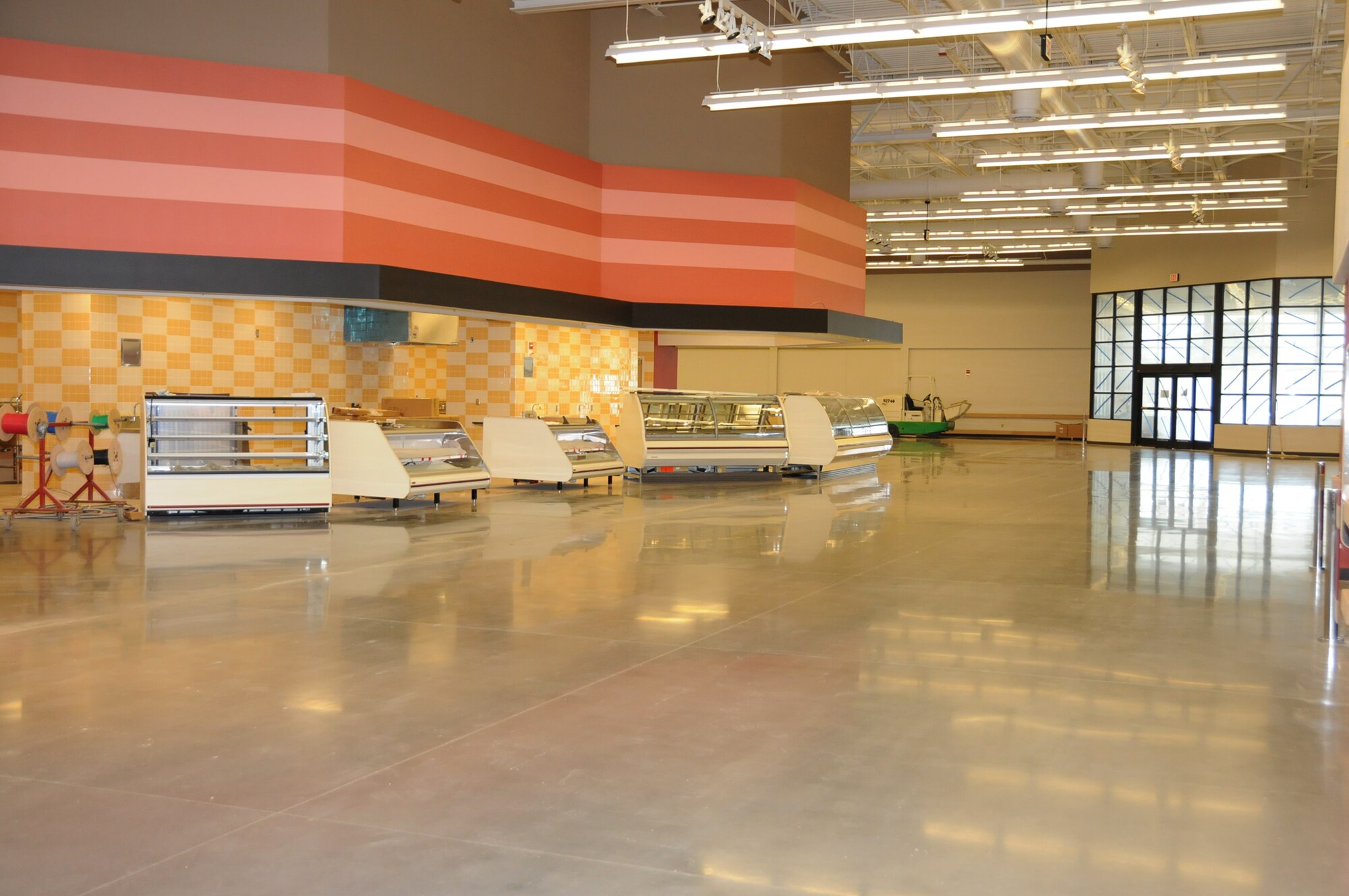 Display cases are in place in the commissary.  (U.S. Air Force photo by Kemberly Groue)