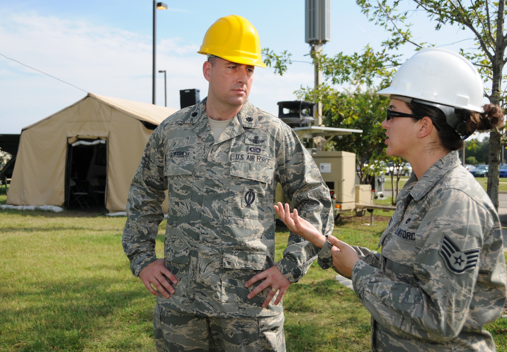 Lt. Col. Daniel Gottrich, left, new commander of the 338th Training Squadron, receives an overview of the squadron’s air expeditionary force training area from Staff Sgt. Ashley Campbell, Sept. 10.  Colonel Gottrich, who took command from Lt. Col. John Thomas Sept. 3, previously served as chief of the international plans and programs branch of the foreign liaison division in the office of the assistant vice chief of staff at the Pentagon.  Colonel Thomas, who commanded the Dark Knights for the past year, becomes the public affairs director for Global Strike Command.  (U.S. Air Force photo by Kemberly Groue)