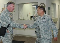 Chief Simmet, right, welcomes General Mulholland to the 919th Medical Squadron’s medical training facility Sept. 1 during the Army special operations leader’s visit to key Duke Field support sites.  (U.S. Air Force photo/Dan Neely)