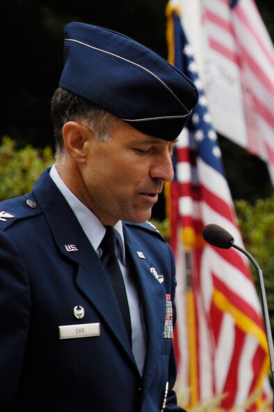 HANSCOM AIR FORCE BASE, Mass. - Col. David Orr, 66th Air Base Wing commander, addresses the crowd consisting of commanders, honorary commanders, civic leaders, law enforcement, and fire and medical professionals during the base’s remembrance ceremony honoring the victims of the Sept. 11, 2001, terrorist attacks. (U.S. Air Force photo by Linda LaBonte Britt)