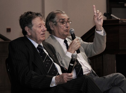 RAF MILDENHALL, England -- Air Cmdr. (retired) Charles Clarke (left) and Andrew Wiseman, former prisoners of war, were two of the guest speakers at the POW/Missing in Action Remembrance Luncheon at the Galaxy Club here Sept. 16. The former Royal Air Force servicemembers told their stories about being shot down over Germany during World War II and their lives in a POW camp. (U.S. Air Force photo/Senior Airman Thomas Trower) 