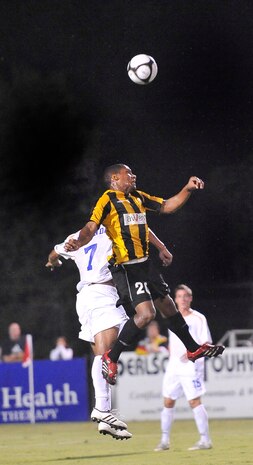 Competitors from the Charleston Battery and Miami F.C. Blue soccer teams compete during a military appreciation night held at Blackbaud Stadium on Daniel Island Sept. 11. The Charleston Battery won the game 2-1. (U.S. Air Force photo/James M. Bowman)