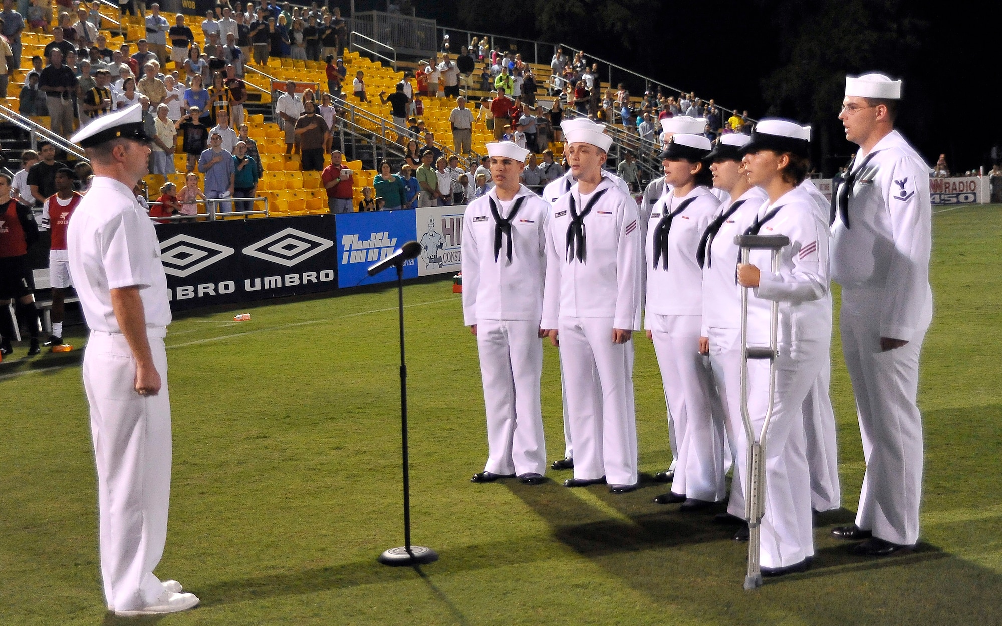 Navy corpsmen sing the national anthem during pre-game ceremonies in support of the Charleston Battery soccer team's military appreciation night held at Blackbaud Stadium on Daniel Island Sept. 11. "Thank You Heroes" was the name of the soccer event played by the Charleston Battery versus the Miami F.C. Blue to honor local military, veterans, fire fighters, police officers and paramedics. (U.S. Air Force photo/James M. Bowman)
