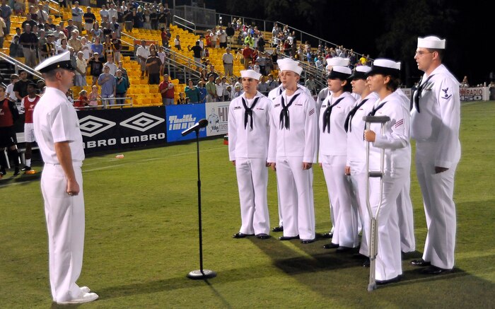 Navy corpsmen sing the national anthem during pre-game ceremonies in support of the Charleston Battery soccer team's military appreciation night held at Blackbaud Stadium on Daniel Island Sept. 11. "Thank You Heroes" was the name of the soccer event played by the Charleston Battery versus the Miami F.C. Blue to honor local military, veterans, fire fighters, police officers and paramedics. (U.S. Air Force photo/James M. Bowman)
