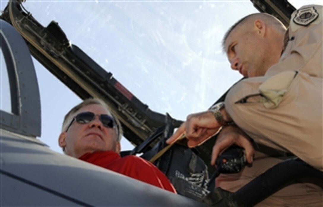 Deputy Secretary of Defense William J. Lynn III talks with Commander of the 455th Air Expeditionary Wing Brig. Gen. Steven Kwast, U.S. Air Force, while touring an F-15E Strike Eagle at Bagram Air Base, Afghanistan, on Sept. 10, 2009.  