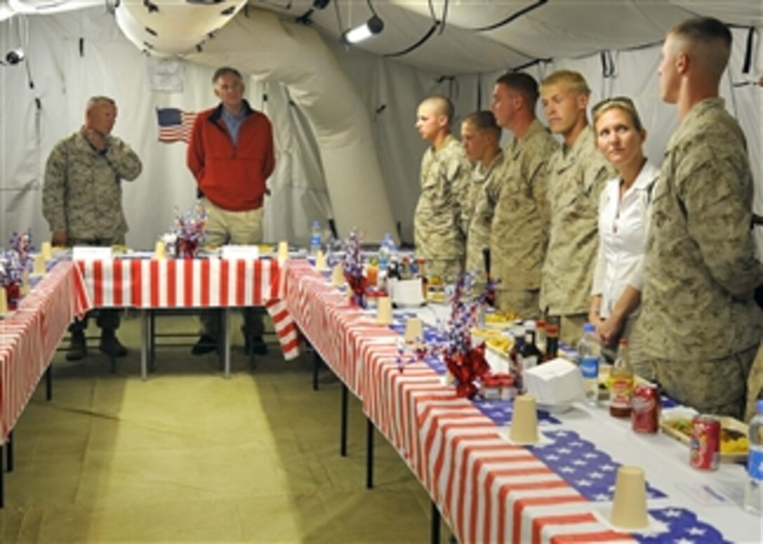 Deputy Secretary of Defense William J. Lynn III has lunch with Marines from the 2nd Marine Expeditionary Brigade while visiting Camp Leatherneck in Bastion, Afghanistan, on Sept.10, 2009.  