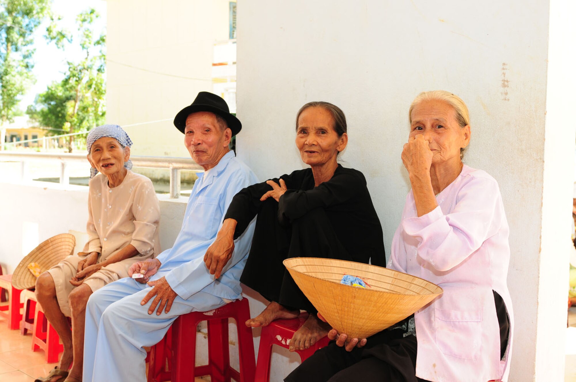 Vietnamese residents of Quant Tri Province wait patiently in line to be seen by Air Force medical professionals Sept. 18 during Operation Pacific Angel 2009.  U.S. military members are in Vietnam Sept. 15-24 to provide humanitarian assistance in cooperation with local authorities to Quang Tri Province residents. Pacific Angel is a Pacific Air Forces operation led by 13th Air Force at Hickam Air Force Base, Hawaii. The joint and combined humanitarian assistance operation is conducted in the Pacific area of responsibility to support U.S. Pacific Command’s capacity-building efforts. (U.S. Air Force photo/Tech. Sgt. Kerry Jackson)