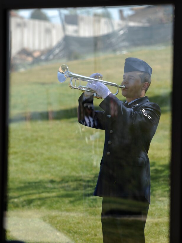 Airman 1st Class Andrew Mahan plays “Taps” at the Black Hills National Cemetery in Rapid City, S.D., Sept. 15. The service was held for a former World War ll veteran. Airman Mahan is a vehicle maintenance apprentice assigned to the 28th Logistics Readiness Squadron. (U.S. Air Force photo by Airman 1st Class Corey Hook)